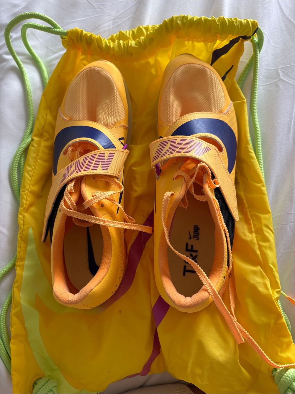 Nike long jump shoes woman 10, man 8.5